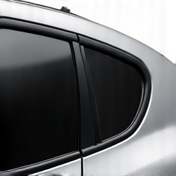 Detailed view of XPEL tint being applied to car window for heat rejection. Close-up of a professional installer carefully smoothing out XPEL ceramic film on a car window, showcasing the precision needed for a bubble-free installation and optimal heat rejection.